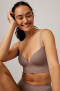 Woman wearing gray bra 