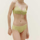 woman in green bra and brief