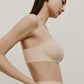 woman in nude strapless bra