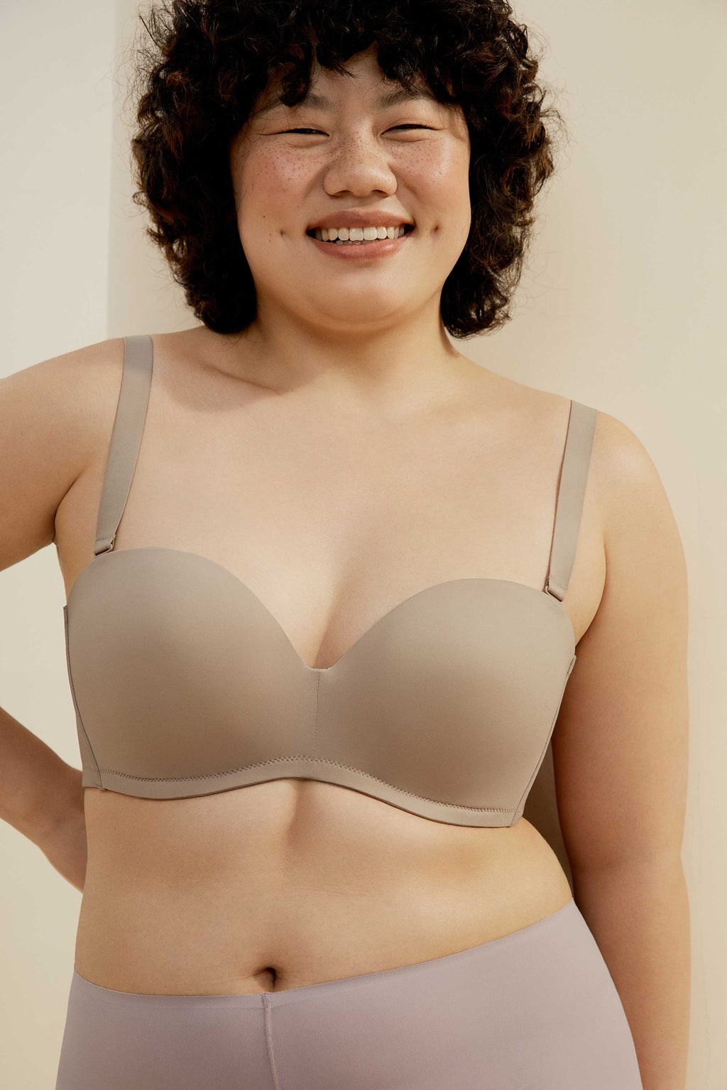 woman in sand bra