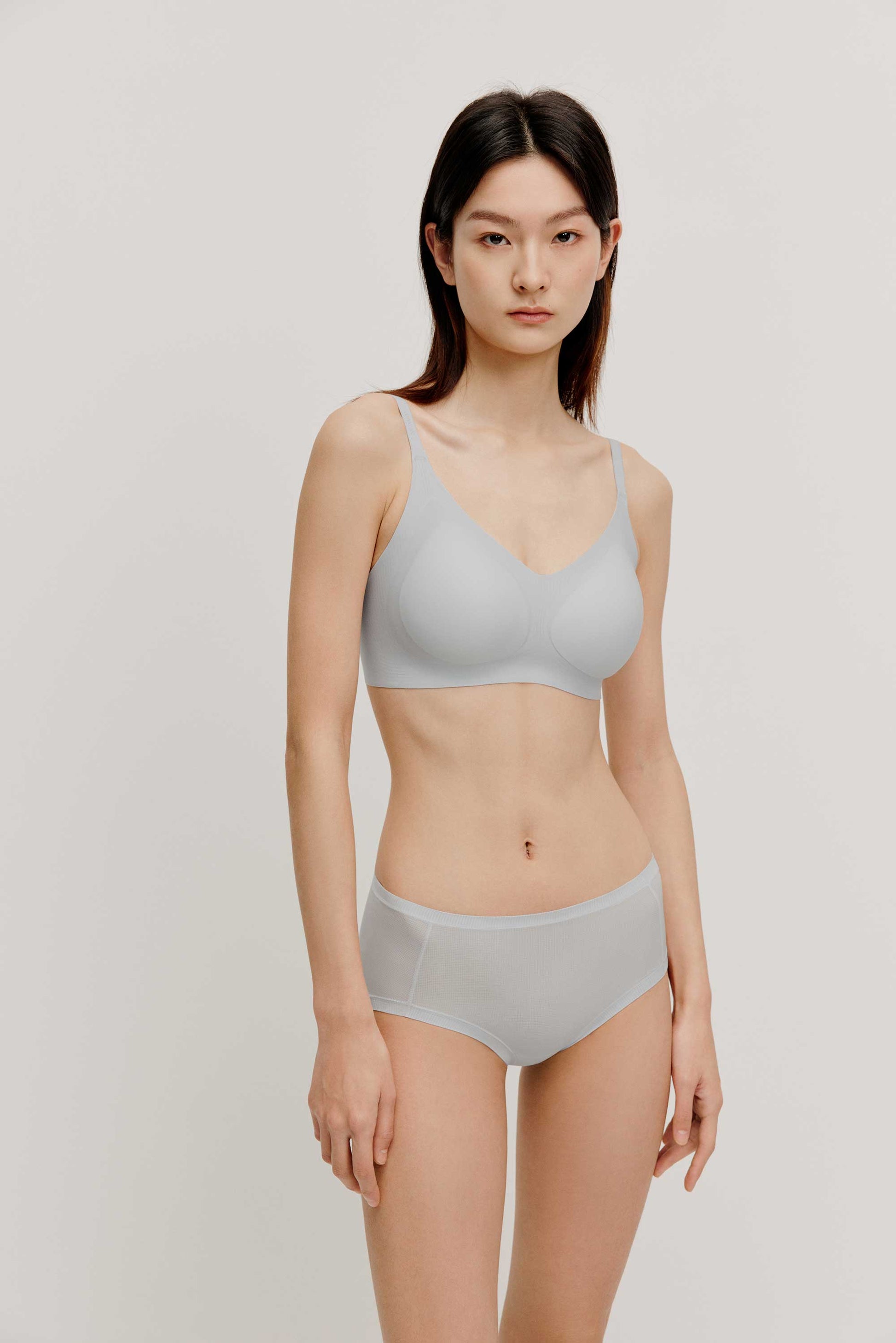 woman in light blue bra and brief