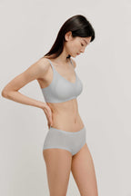 woman in light blue bra and brief