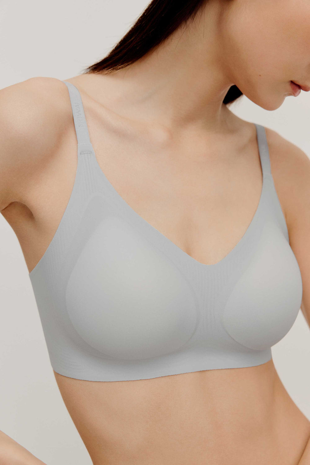 woman in light blue bra