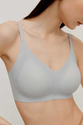 woman in light blue bra