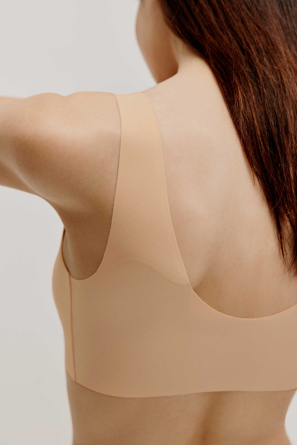 close up of the back of a nude bra
