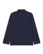flat lay image of navy pajama button up shirt