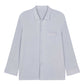 flat lay image of blue pajama button up shirt