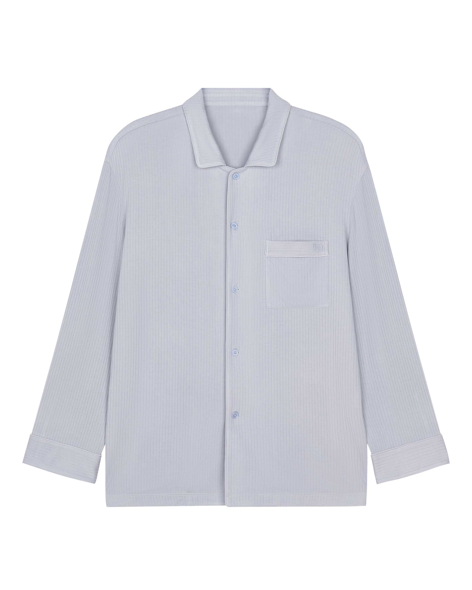 flat lay image of blue pajama button up shirt