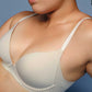 Woman wearing cream bra