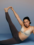 Woman wearing leggings and stretching legs