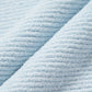 fabric detail of blue tank
