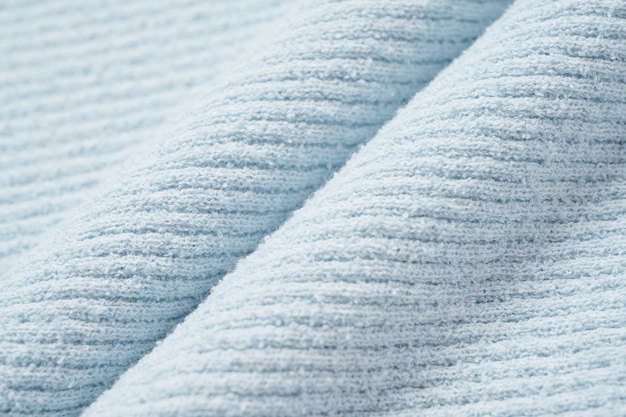 fabric detail of blue tank