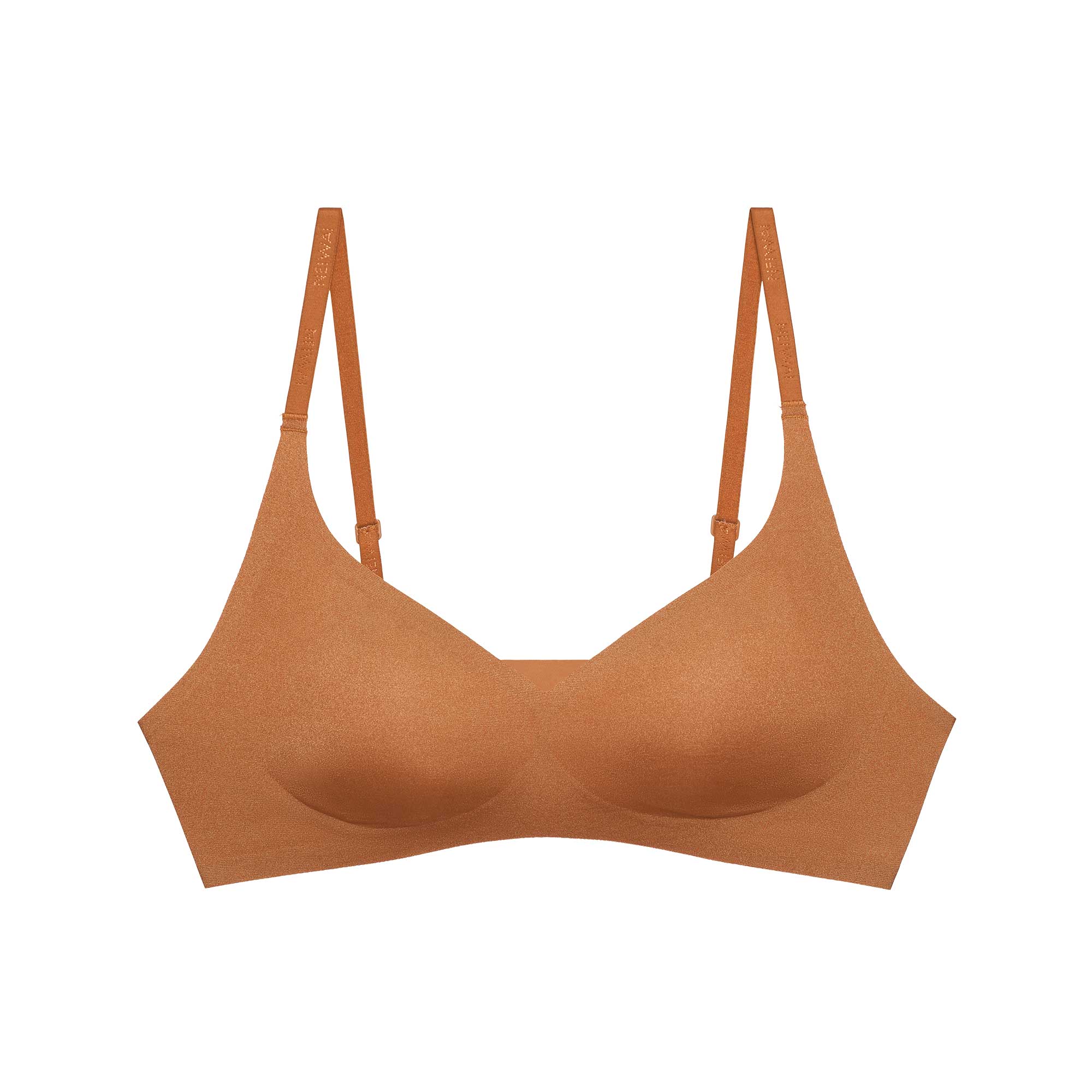 Flat lay image of an orange bra with scoop neckline and thin straps