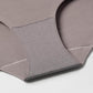 Close-up view of the inner lining and stitching details of a gray purple seamless brief, highlighting the soft fabric and precise construction.