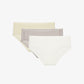 Flat lay of a beige brief, gray brief, and white brief stacked on top of one another