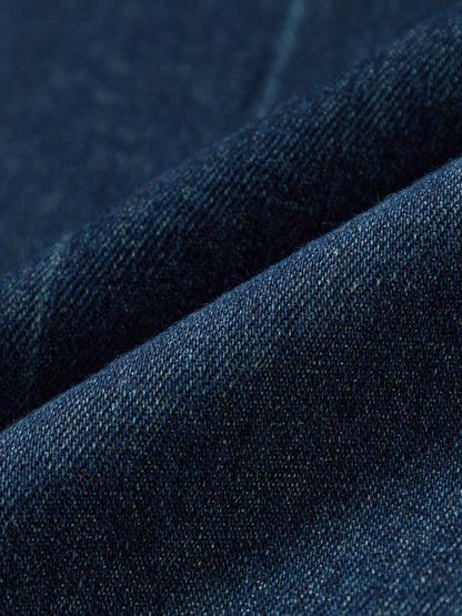 Close-up of dark blue denim fabric 