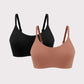 two bras in black and rust color flat lay