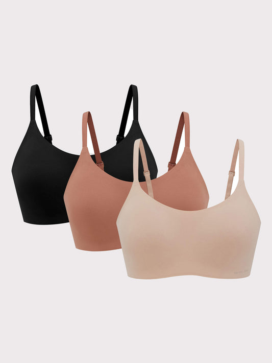 three bras in black rust color and beige