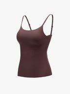 A dark brown camisole tank top with thin adjustable shoulder straps, displayed on a ghost mannequin against a plain white background. Seal Brown