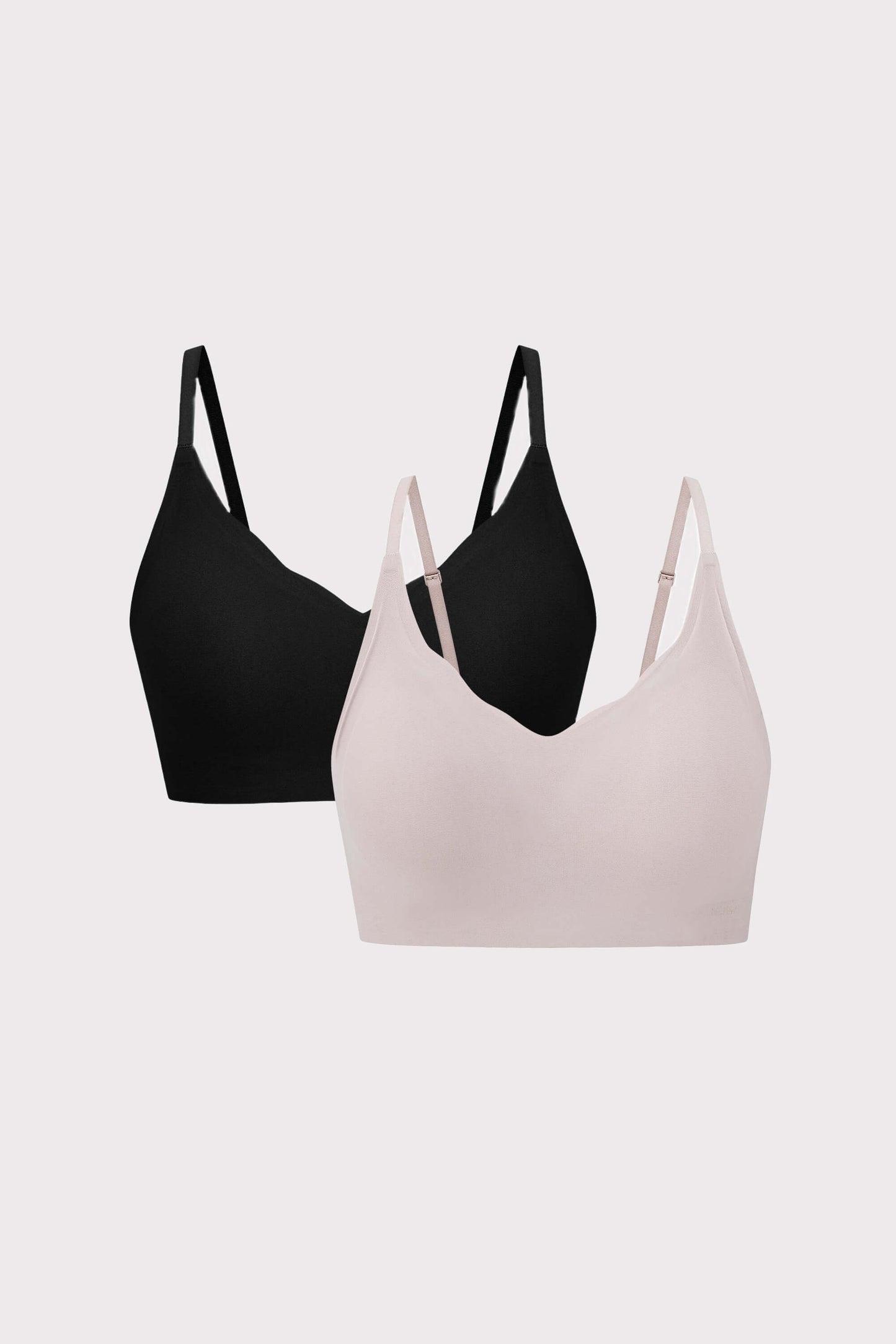 two bras in black and light pink