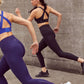 two woman running in sports bra and leggings
