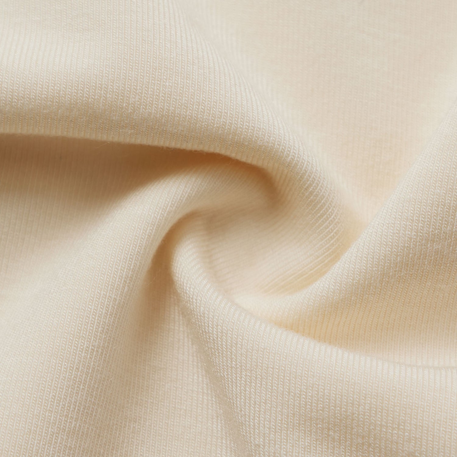 Close-up of beige fabric with a soft texture