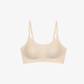 Flay lay of light cream colored bra.