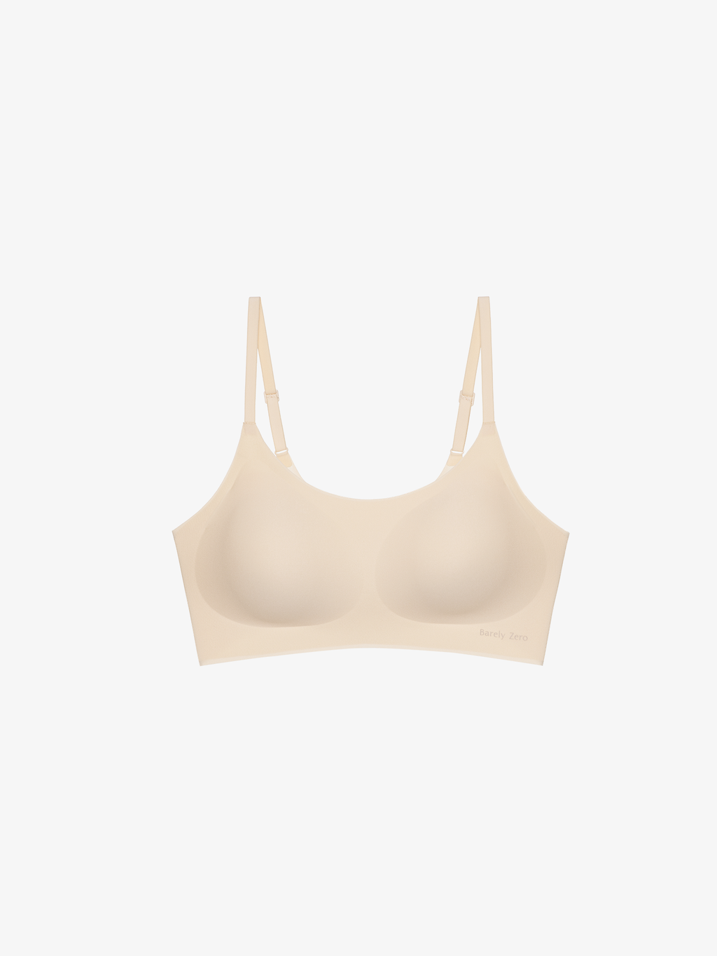 Flay lay of light cream colored bra. Peach Pure color.