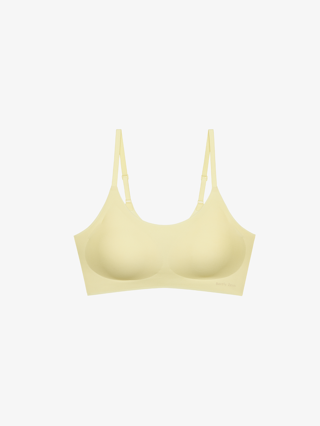 Flat lay of yellow bra. Asparagus Green color.