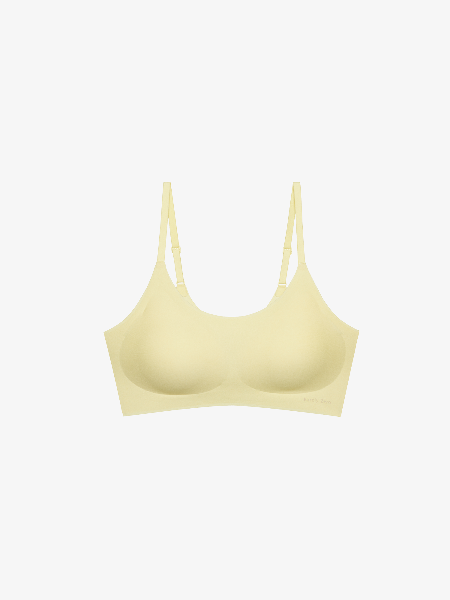 Flat lay of yellow bra. Asparagus Green color.