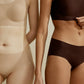 Two women standing side by side, wearing minimalist underwear in neutral tones. One is in a beige Barely Zero Classic Bra + Brief Set, while the other is in a chocolate brown bra and
