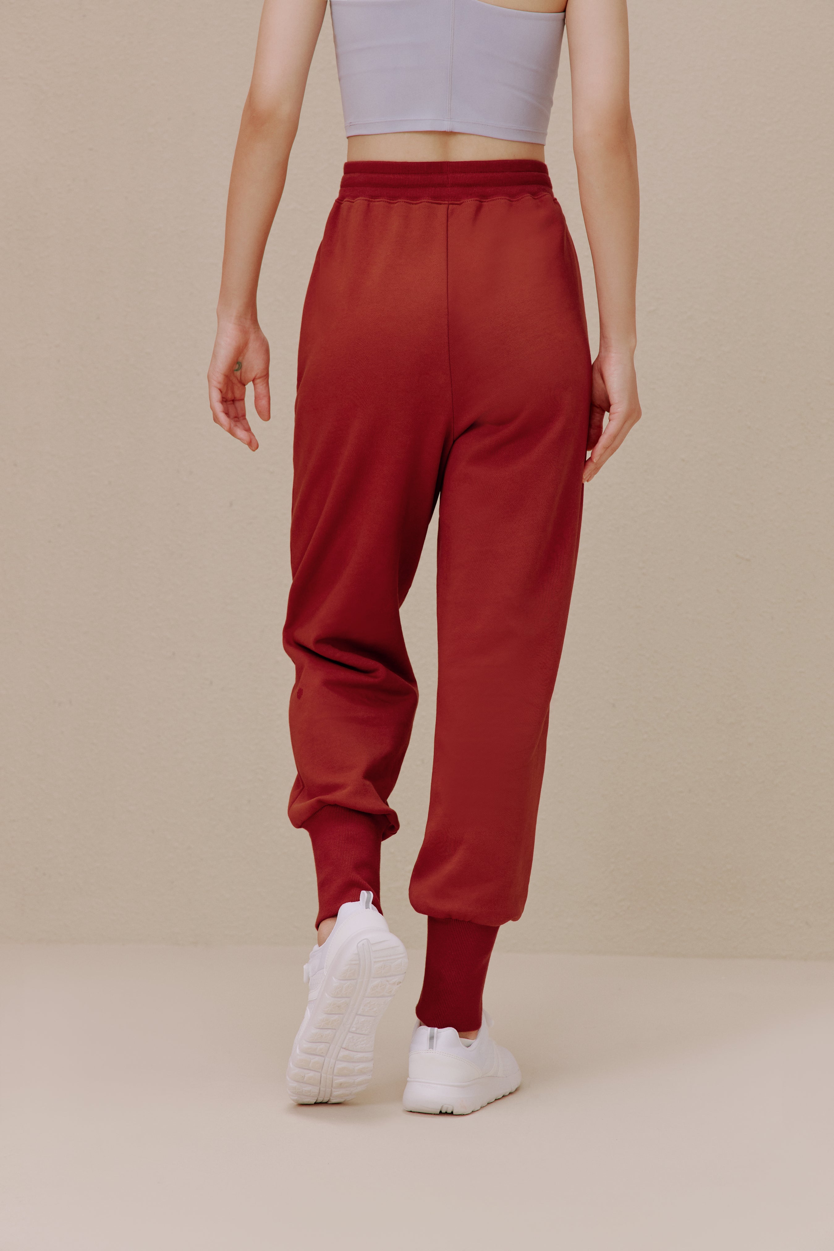 back of women in red pants