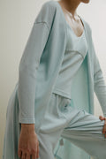 side of women in pale blue ribbed cardigan and pajamas set