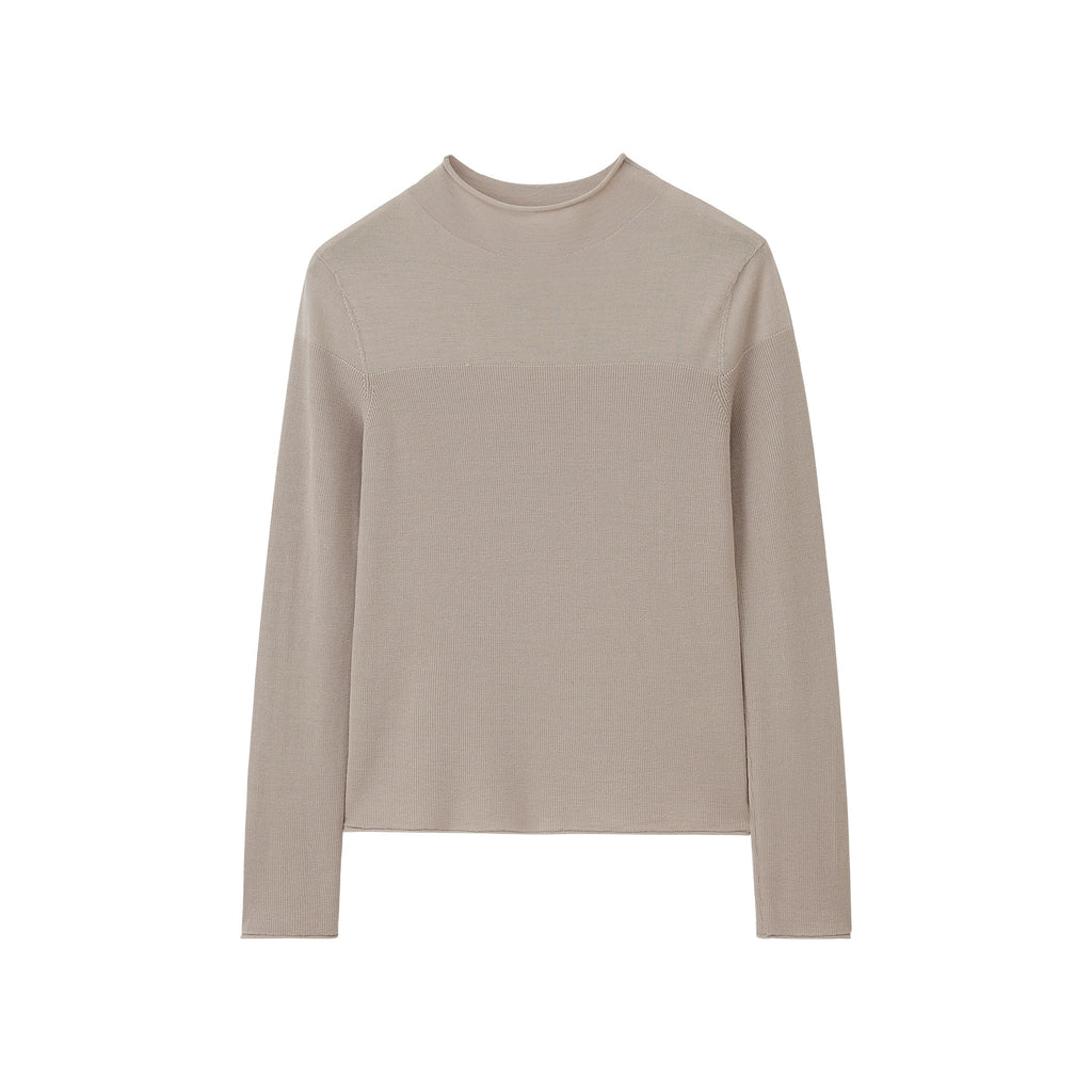 a grey silky wool mock neck sweater