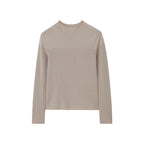 a grey silky wool mock neck sweater