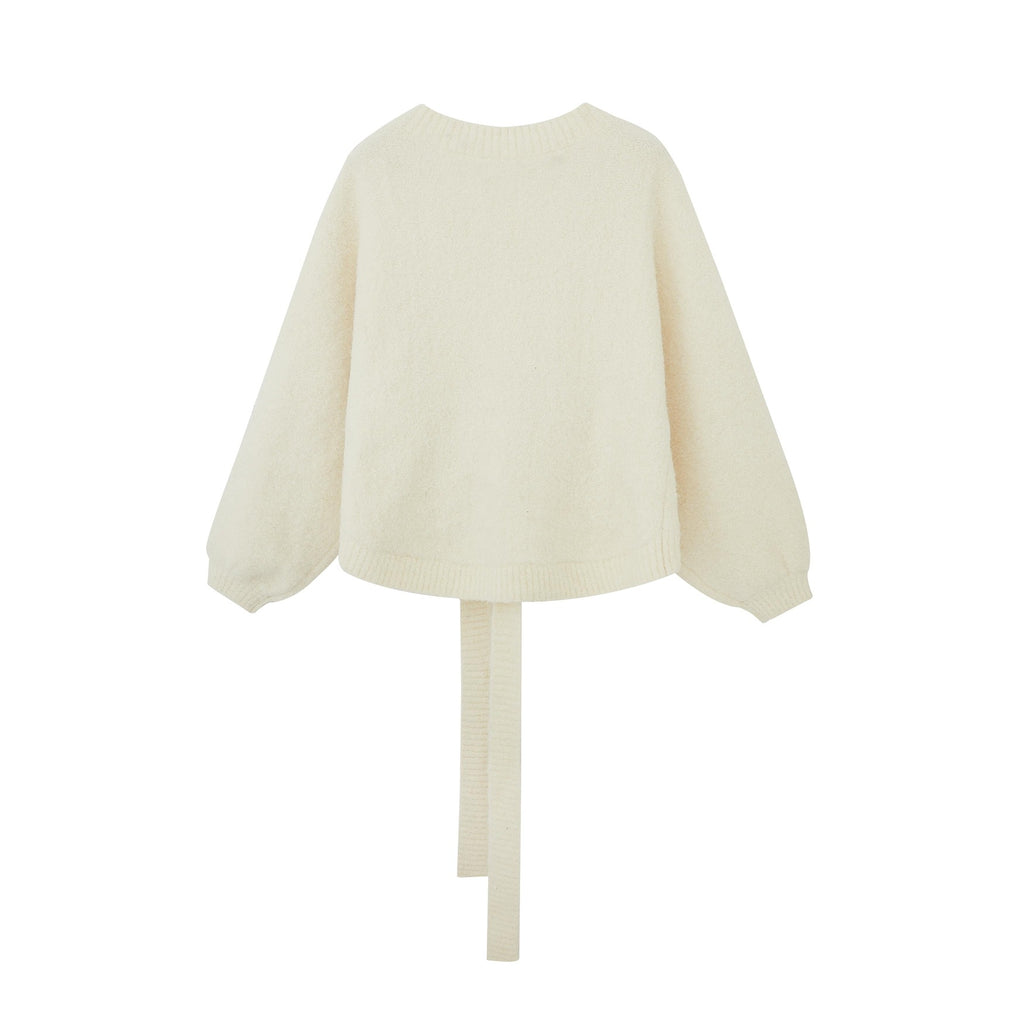 back of white Alpaca Wrap Cardigan flat lay