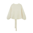 back of white Alpaca Wrap Cardigan flat lay
