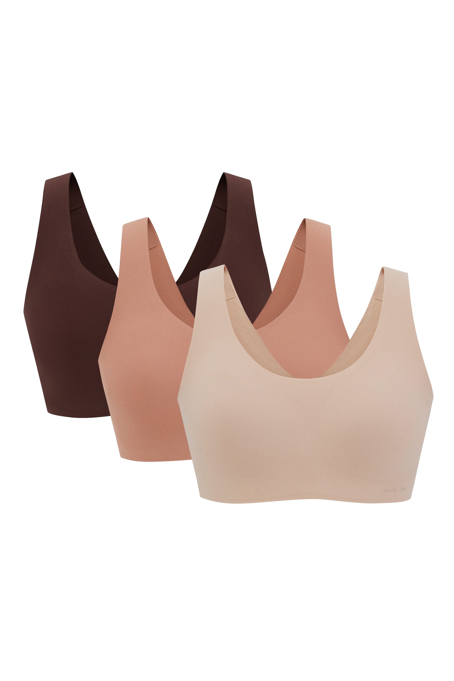 Three Barely Zero Classic Bra Trios in gradient shades of brown, arranged from dark to light, displayed on a neutral background.