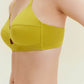 close up of woman in mustard bra and brief