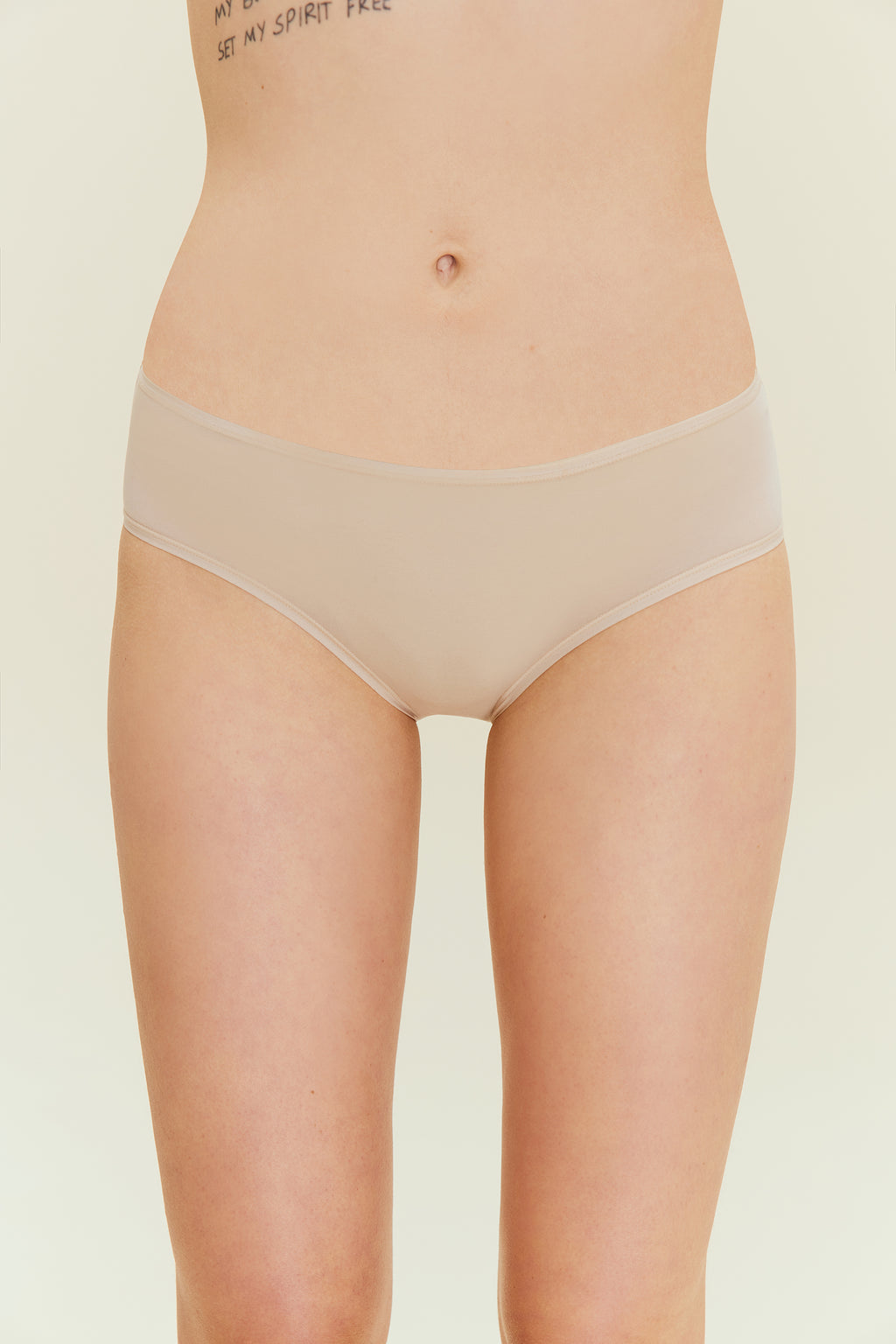woman in beige brief