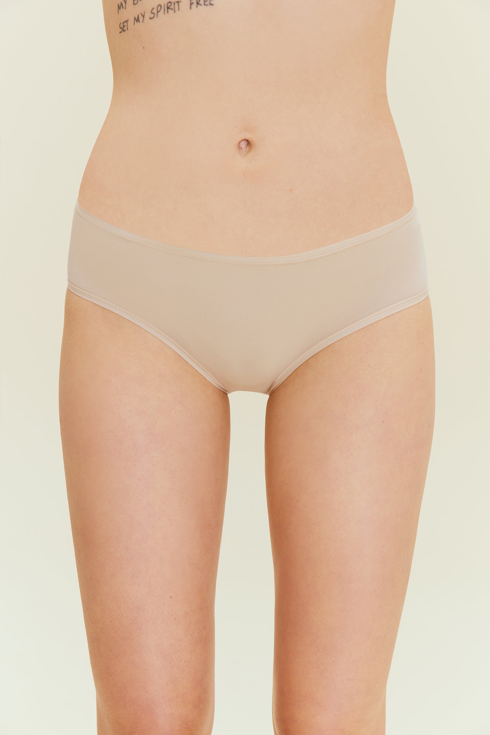 woman in beige brief