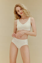 woman in white bra and underwear