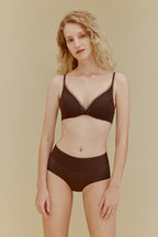 Woman in brown bra and panties