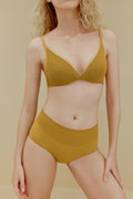 Woman in yellow bra and panties