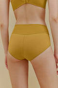 Woman in yellow panties
