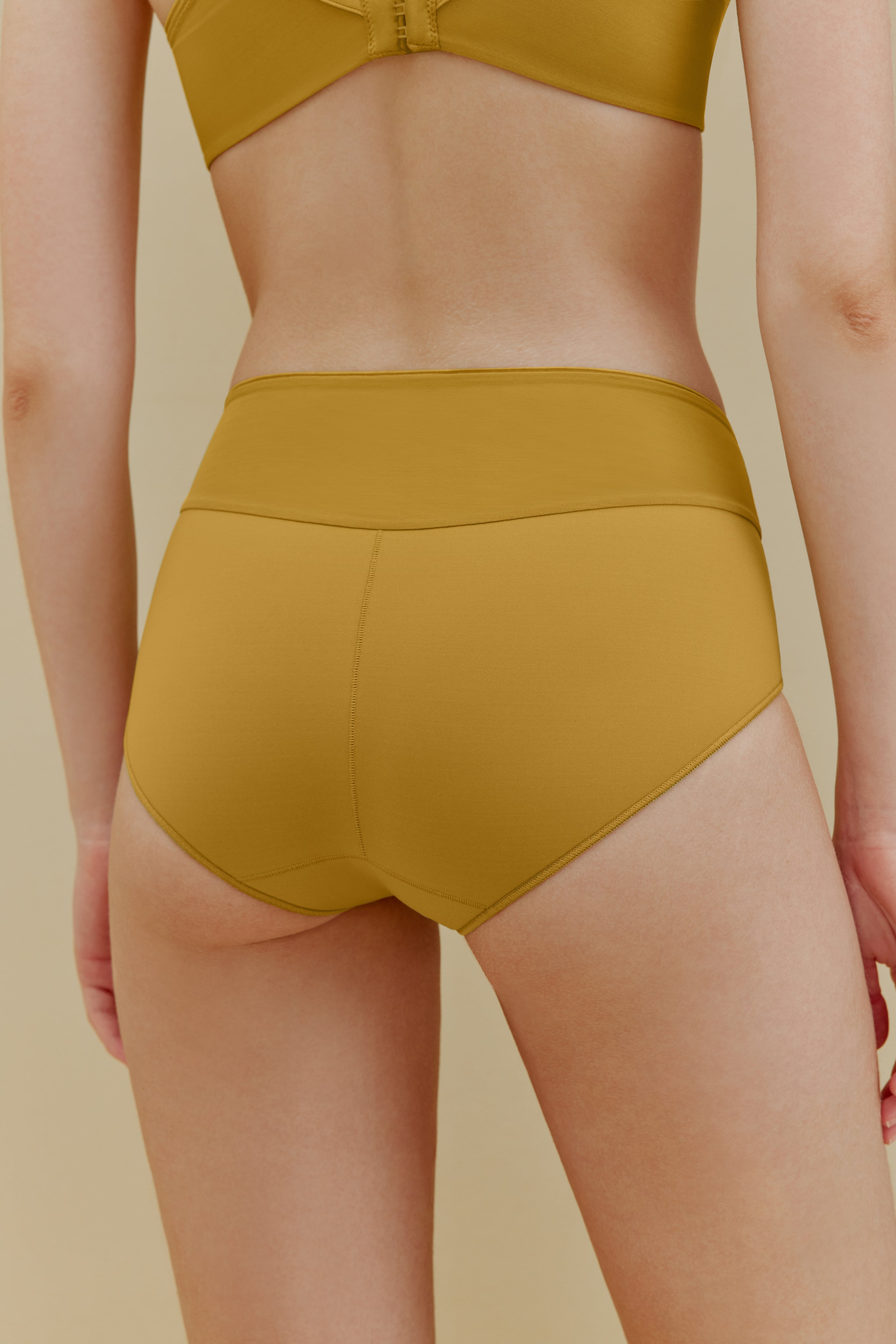 Woman in yellow panties