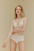 Woman in white bra and panties