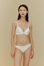 Woman in white bra and panties