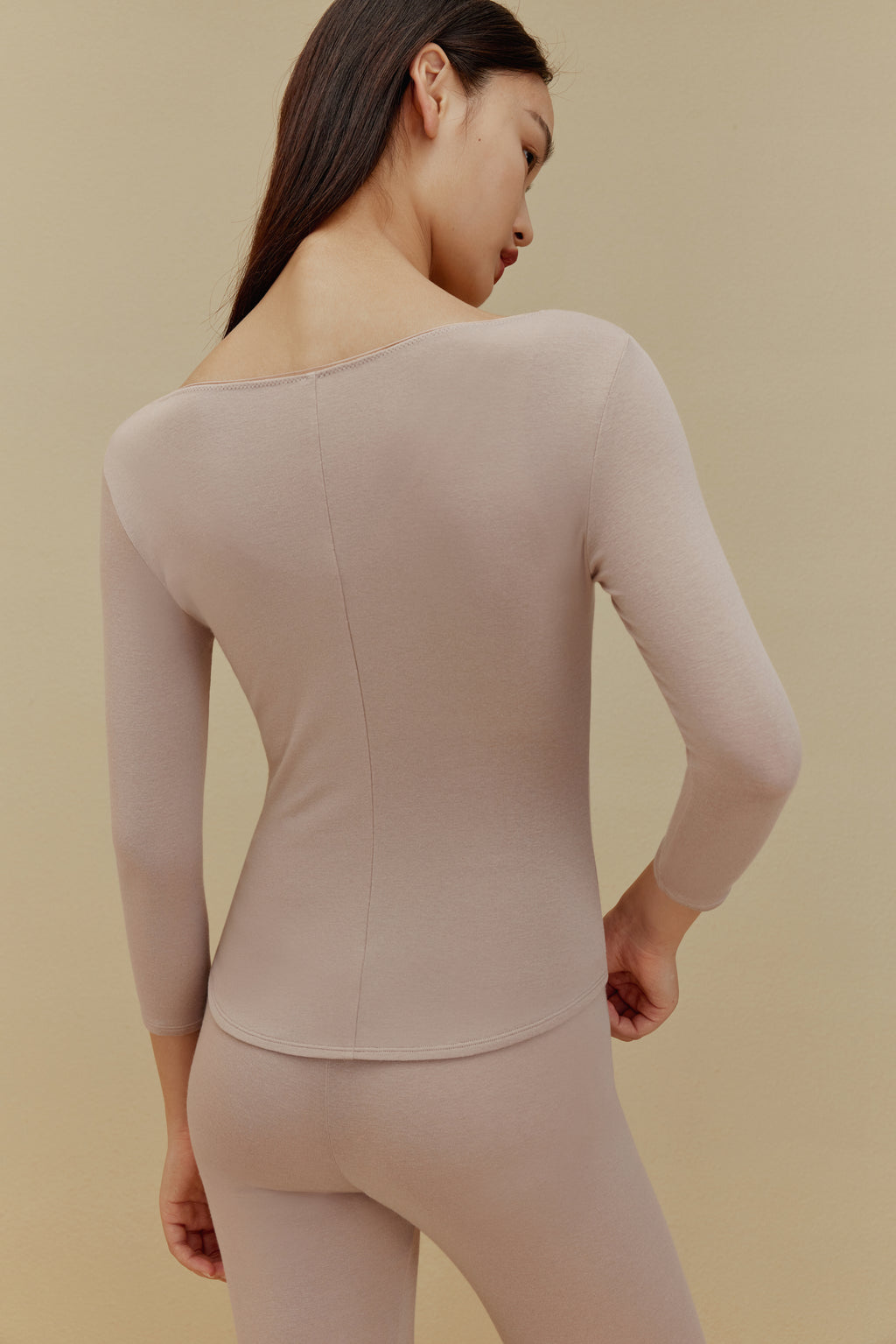 back of women in chai thermal underwear set