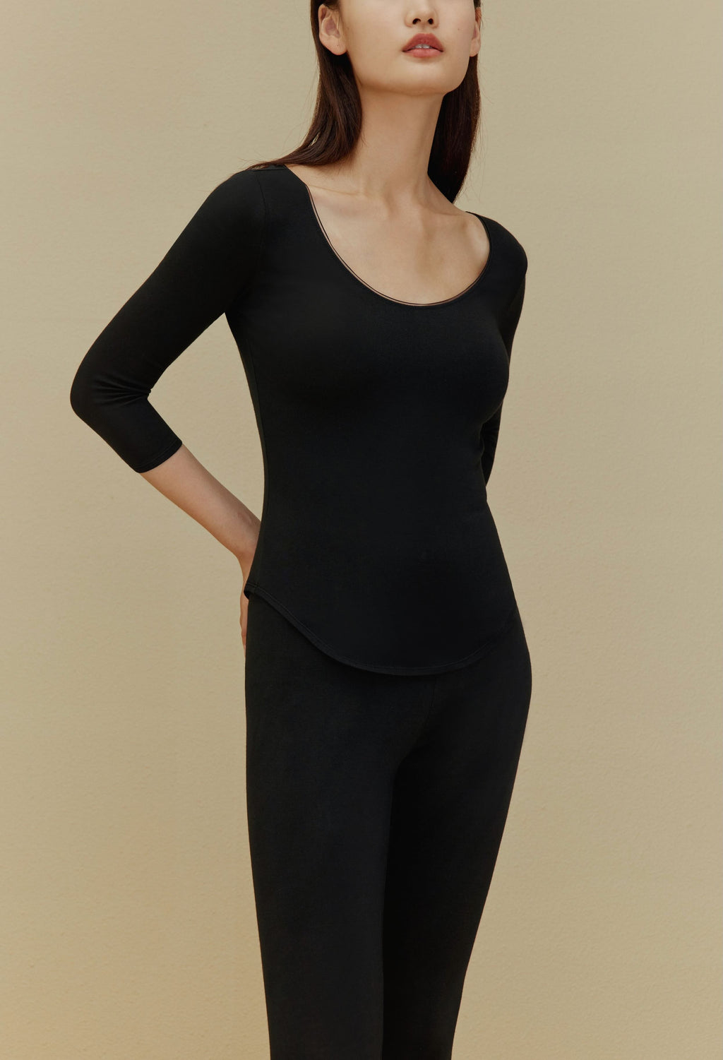 women in black thermal underwear set